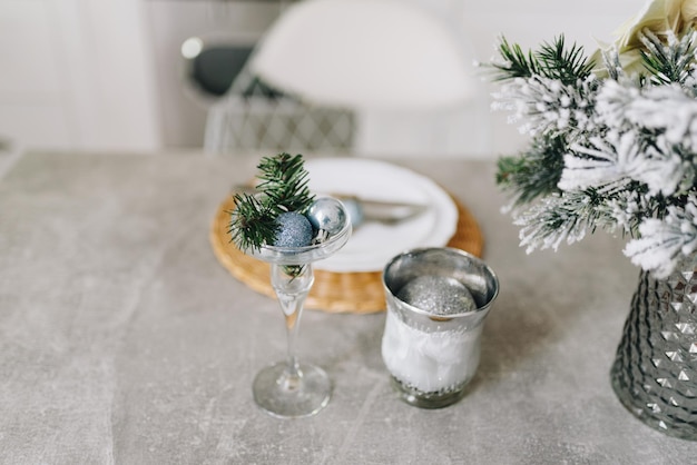 Cozy modern Christmas interior design idea for kitchen space, decorated in silvers and blue