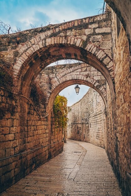 Cozy narrow small Street in the Old City of Jerusalem Israel Typical stoned houses