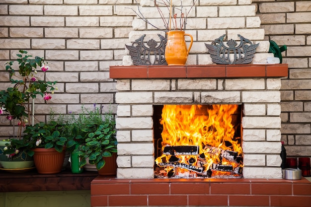 Cozy outdoor fireplace on a patio