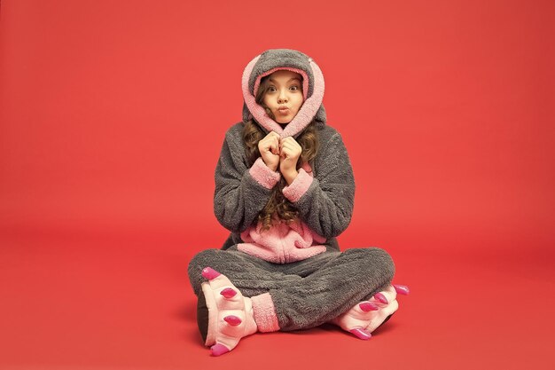 Cozy pajamas clothes shop domestic clothes easter day rest and
relax cute bunny kid baby animal character girl in bunny costume
child rabbit kigurumi happy girl bunny pajamas