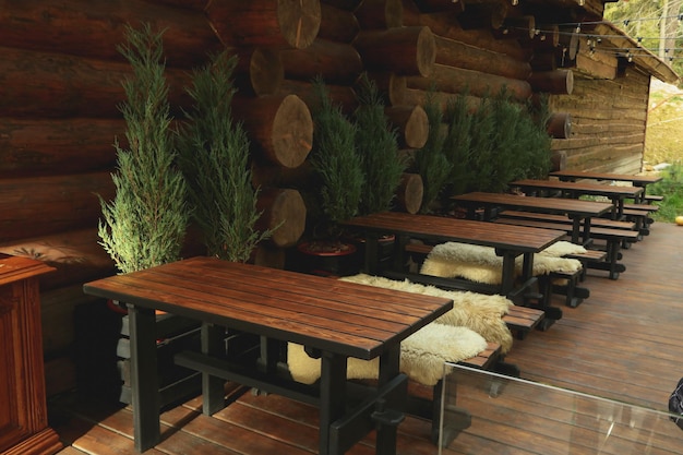 Cozy restaurant with outdoor tables in mountain resort