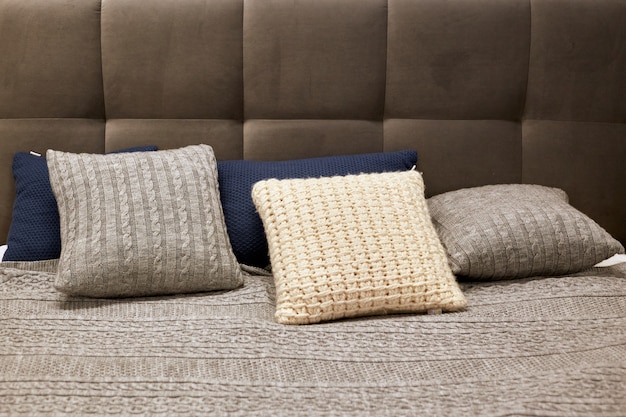 Cozy scandinavian style pillows on a sofa