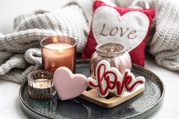 Cozy still life for valentines day with decor details and gingerbread