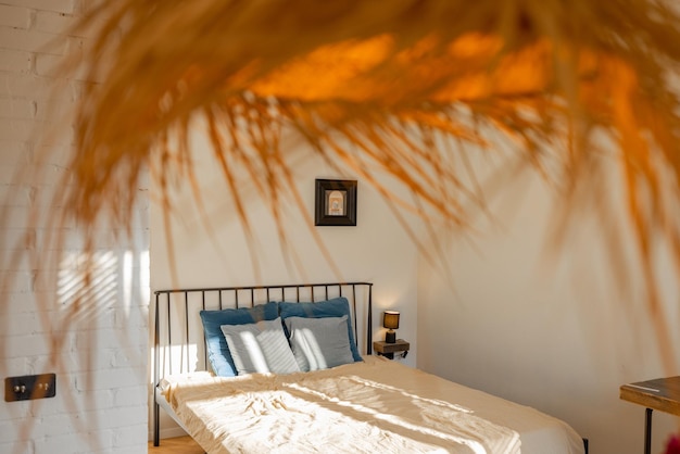 Cozy and sunny bedroom interior