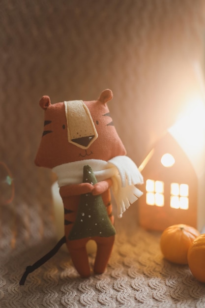 Cozy warm christmas atmosphere with a tiger toy symbol of new