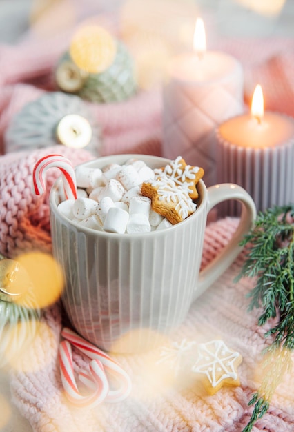 Cozy winter and Christmas setting with hot cocoa and homemade cookies