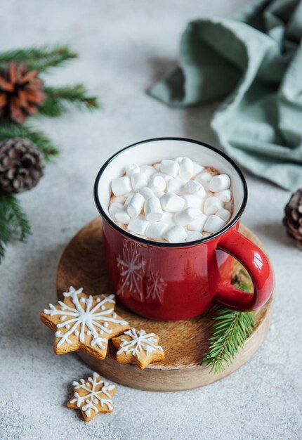 Cozy winter and Christmas setting with hot cocoa and homemade cookies