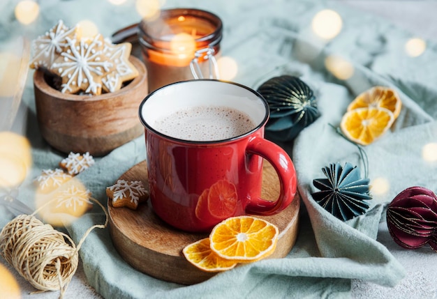 Cozy winter and Christmas setting with hot cocoa and homemade cookies