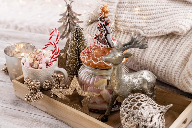 Cozy winter composition with a cup and Hot chocolate with marshmallow.