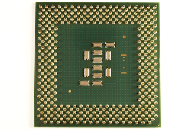 CPU An old processor of 2001 release P III800 on a white background Focus in the foreground