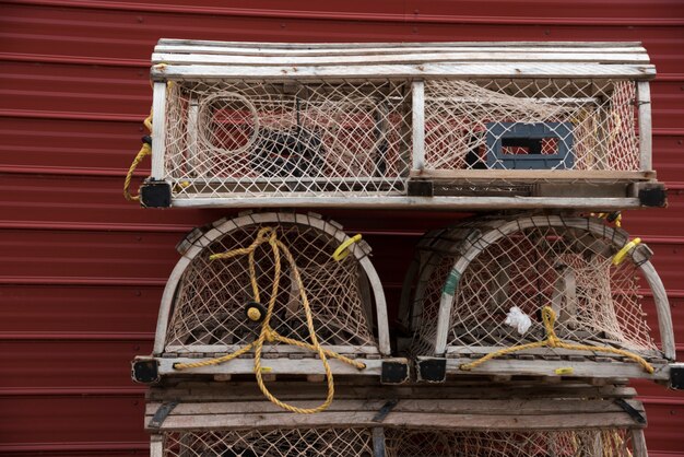 Crab pots stacked by wall, souris, kings county, prince edward\
island, canada