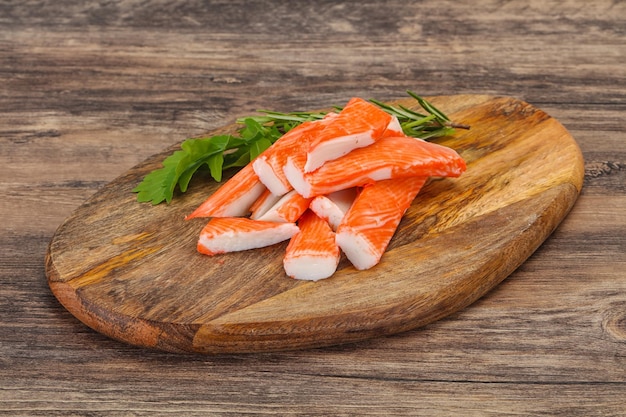 Crab stick surimi over board