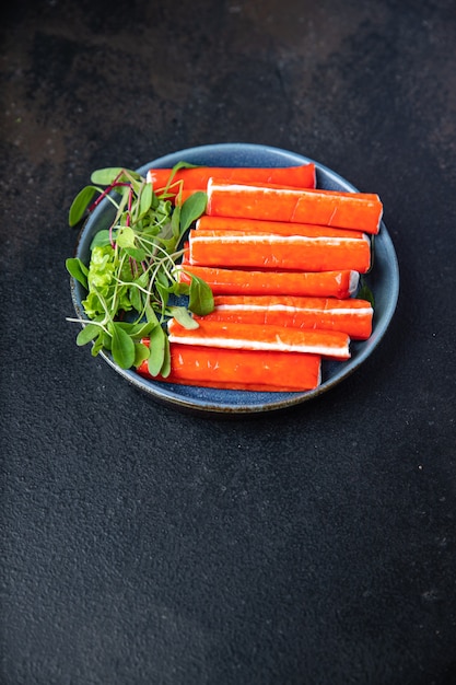 crab sticks semifinished seafood fresh portion ready to eat meal snack on the table copy space