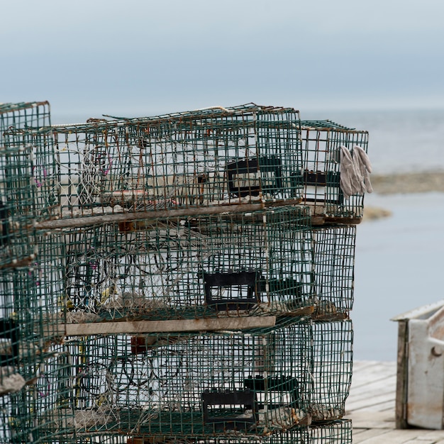 Crab traps stacked, parson\'s pond, newfoundland and labrador,\
canada