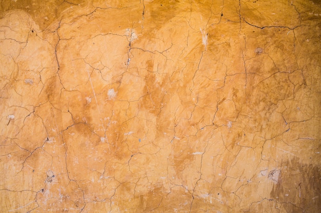 Crack clay wall texture and background,material construction