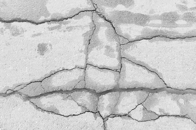 Crack on the ground white background / abstract white vintage\
background broken texture