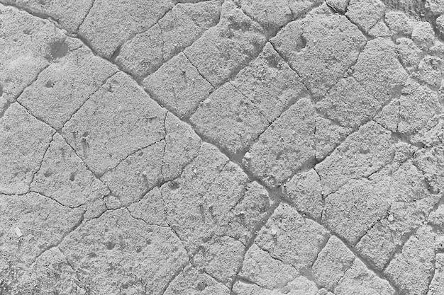 Crack on the ground white background / abstract white vintage
background broken texture