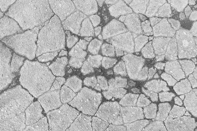 Crack on the ground white background / abstract white vintage
background broken texture