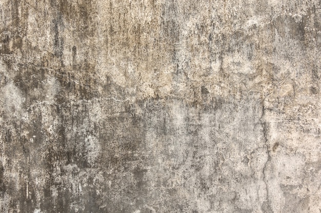 Crack and old gray color cement wall background