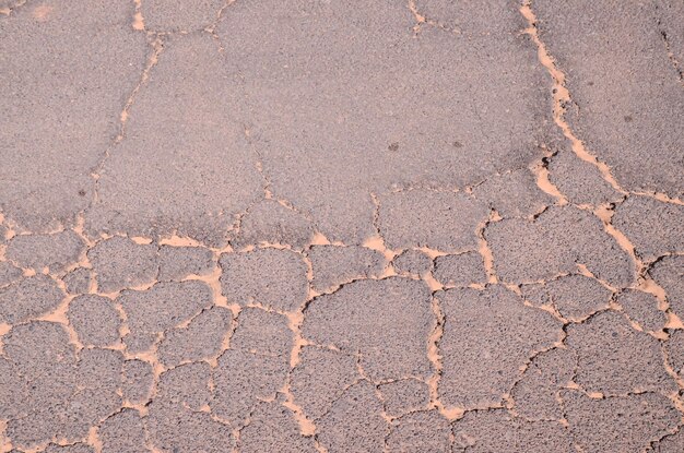 Photo cracked asphalt road