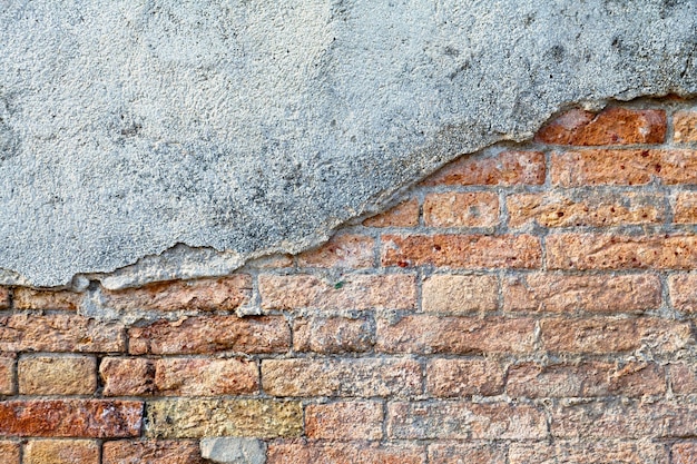 Cracked concrete brick wall background