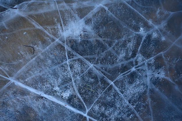 cracked ice texture, abstract seasonal winter cold background, natural ice, broken ice on a lake