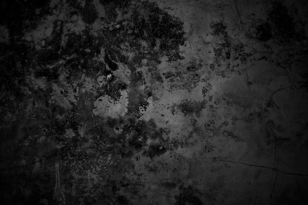 Pareti incrinate il pavimento in cemento grigio scuro è invecchiato in un concetto retrò texture di un muro di cemento nero grungy come sfondo