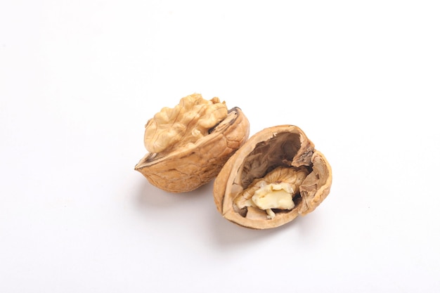 cracked walnut, isolated on white background