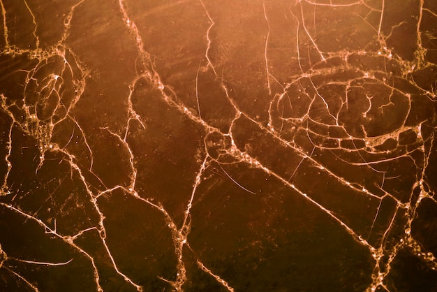 cracked wooden wall with brown paint abstract background