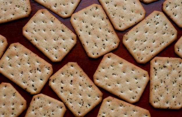 Crackers on wooden table