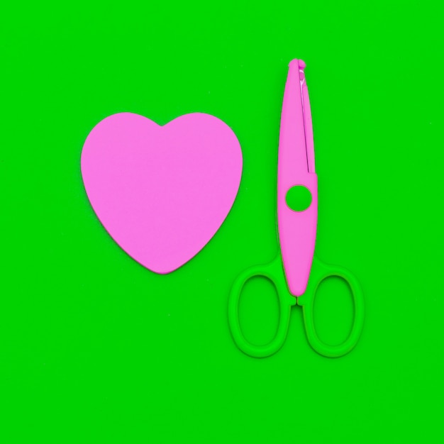 Photo craft minimal set scissors and paper heart. falat lay art