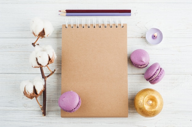 Craft notebook with purple macarons