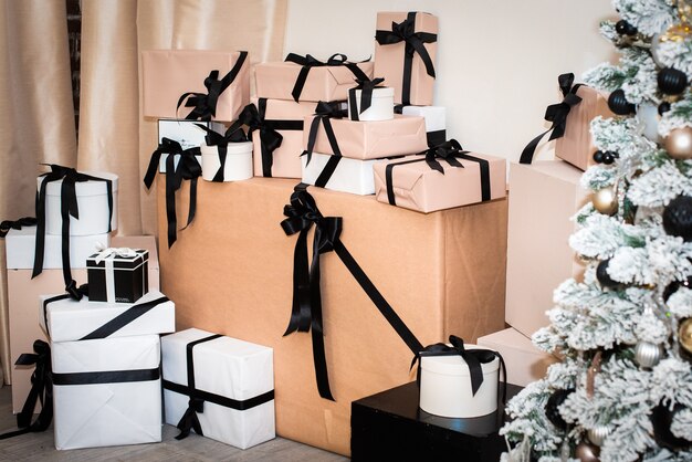 Craft packaging for gifts. beige, white, black. ease of packaging. zero waste, eco-friendly. Christmas tree