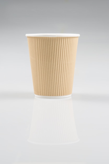Craft paper coffee cup box on the white table