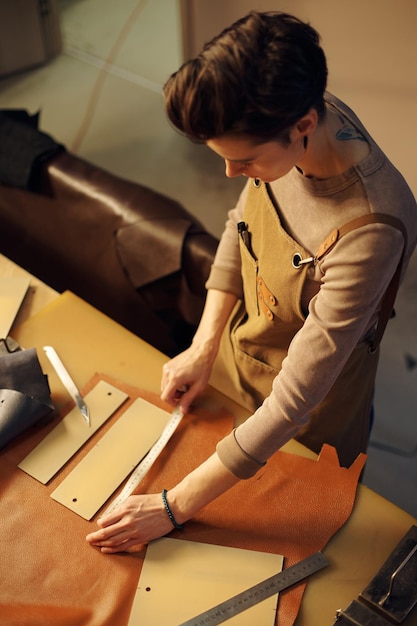 Crafting Leather Goods Under Studio Lighting