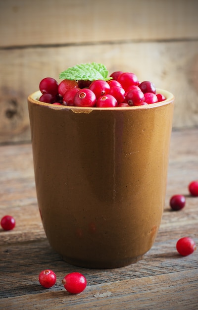 Cranberries in a ceramic mug