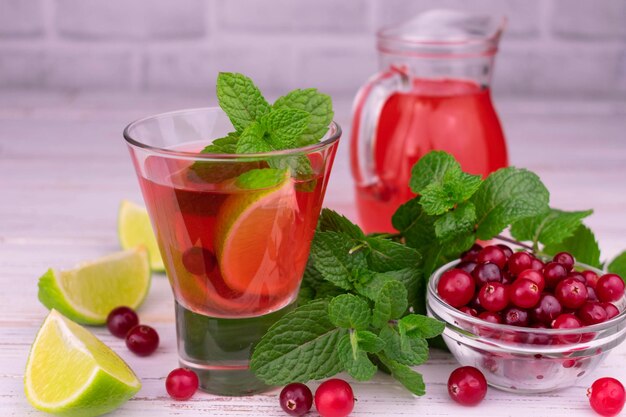 Cranberry, lime and mint cocktail. Refreshing vitamin drink.