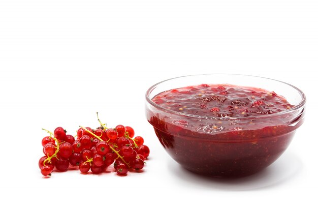 Cranberry sauce in bowl for Thanksgiving dinner isolated on white background