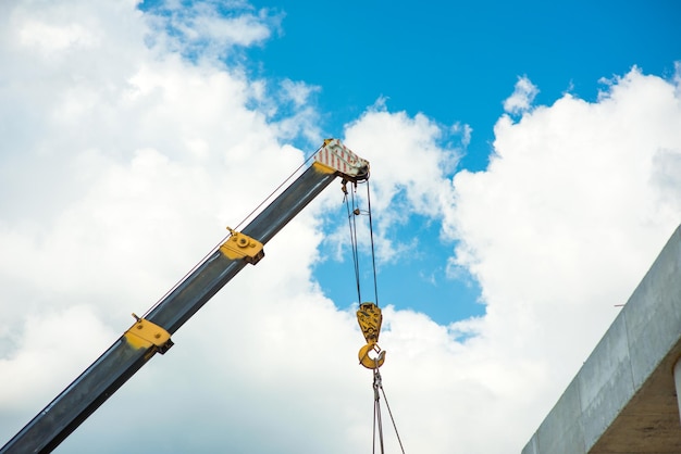 Crane boom with construction hook