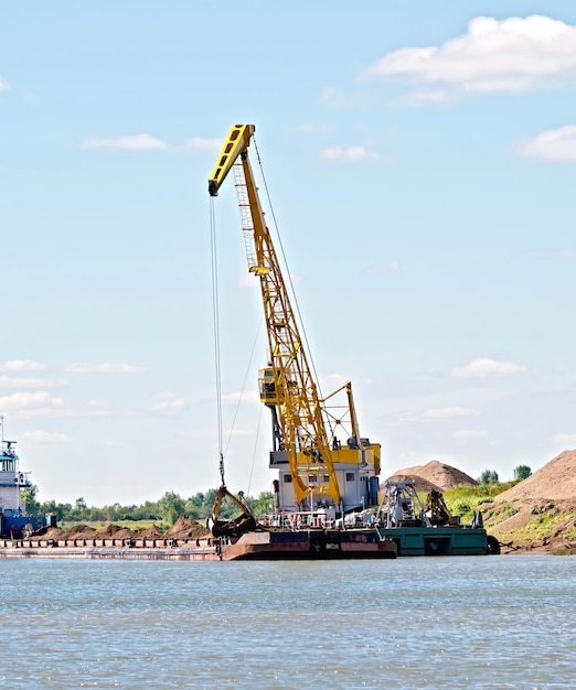 Crane river with barge