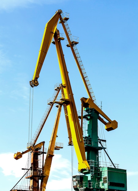 Crane at the scrapyard in the seaport in Kamchatka