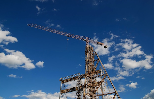 crane with dramatic clouds  in background