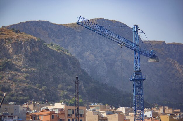 Cranes in Banghera Port at sunset