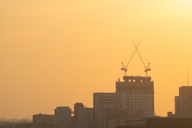 Photo cranes on construction site.