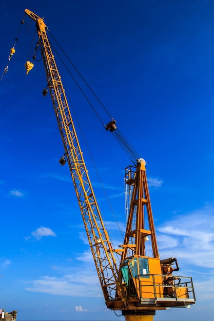 Cranes used in industrial applications and support.