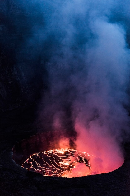 Photo crater of nyiragongo volcano in eruption