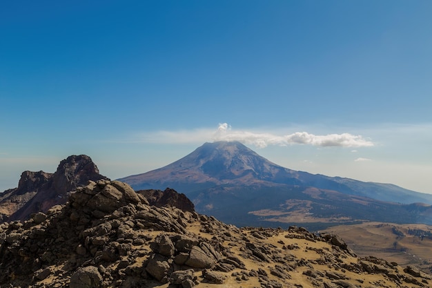 Crater of popocatepetl volcano seen from iztaccihuatl