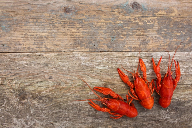 Crawfish on the old wooden background