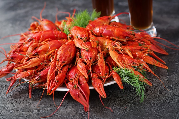 Crayfish. Red boiled crawfishes on table in rustic style, closeup. Lobster closeup. 