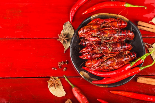 Crayfish. red boiled crawfishes on table in rustic style, lobster closeup